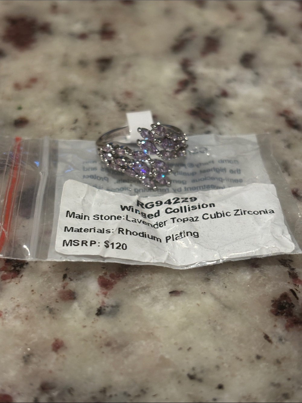 Bomb Party size 8 Lavender Topaz Cubic Zirconia Winged Ring - Rhodium Plated